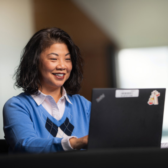 Woman sitting at her laptop