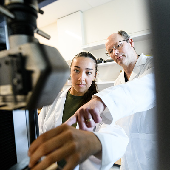 Professor Gary Weber and student Raven Haines work in the Materials Lab inside Gonzaga's Bollier Center.