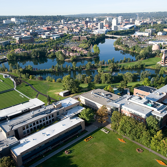 Aerial view of campus downtown Spokane divided by the river 