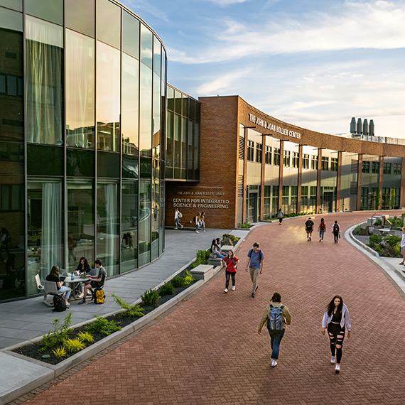 Students walk in front of Bollier Center for Integrated Science & Engineering.