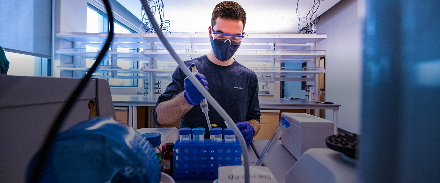 A student works in the biology lab at the Bollier Center.