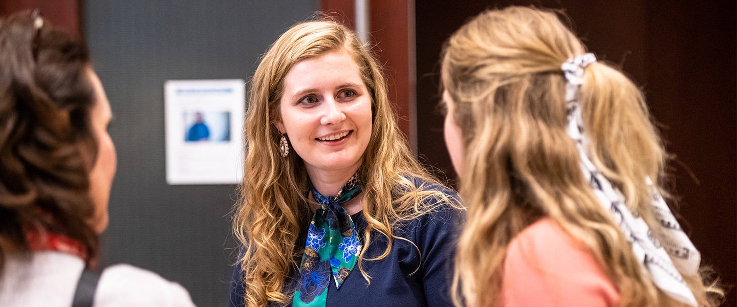 Leadership students discuss at a conference