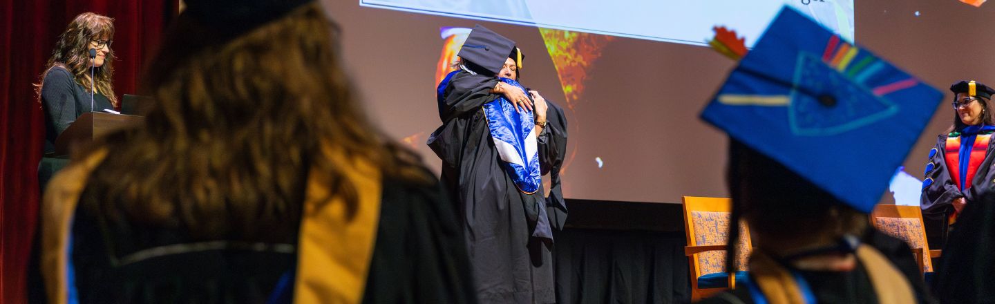 Counselor Education Student being hooded 