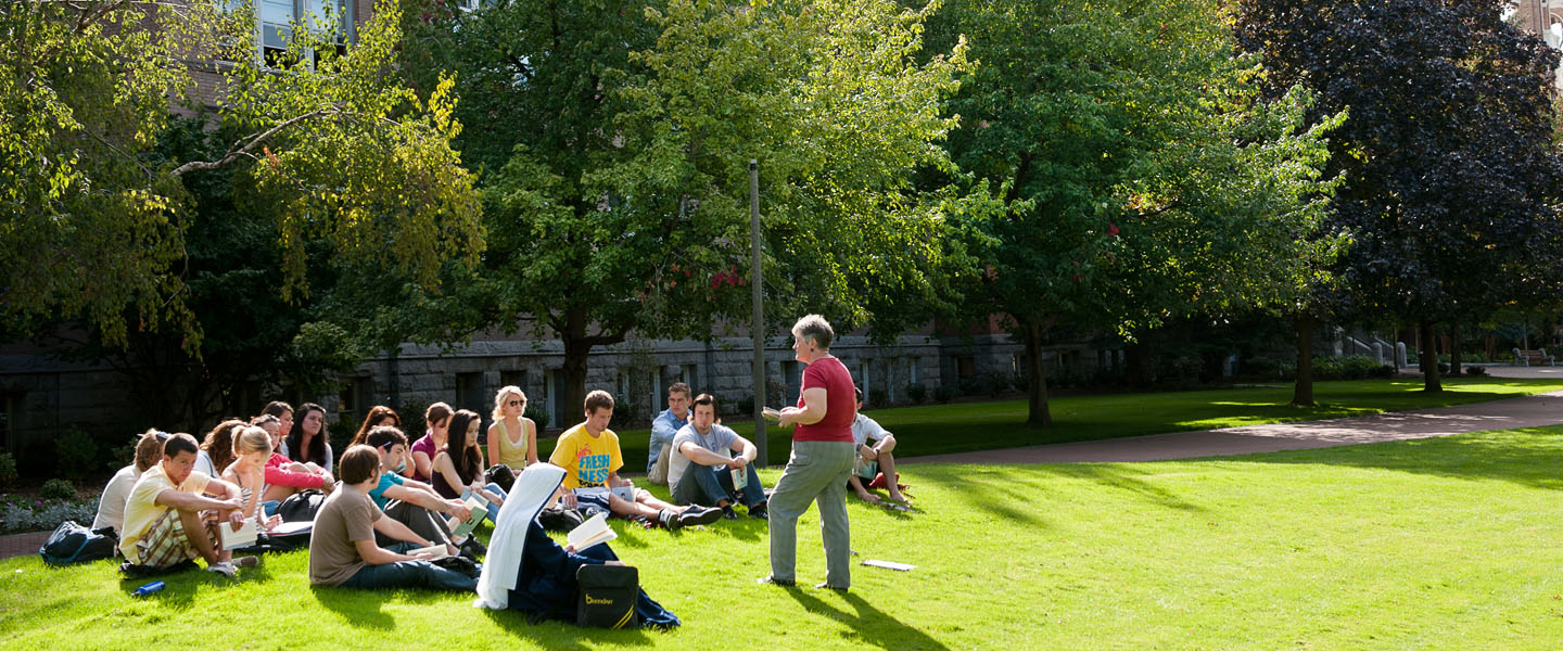 class outside in front of college hall 