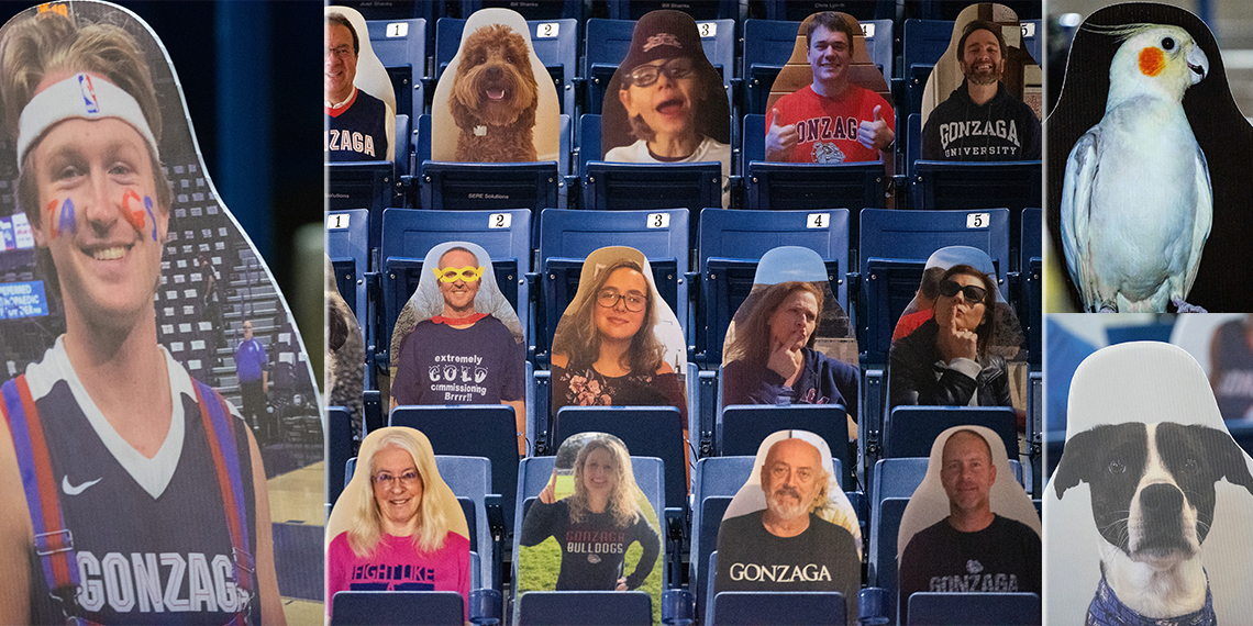 cutouts of fans in the stands