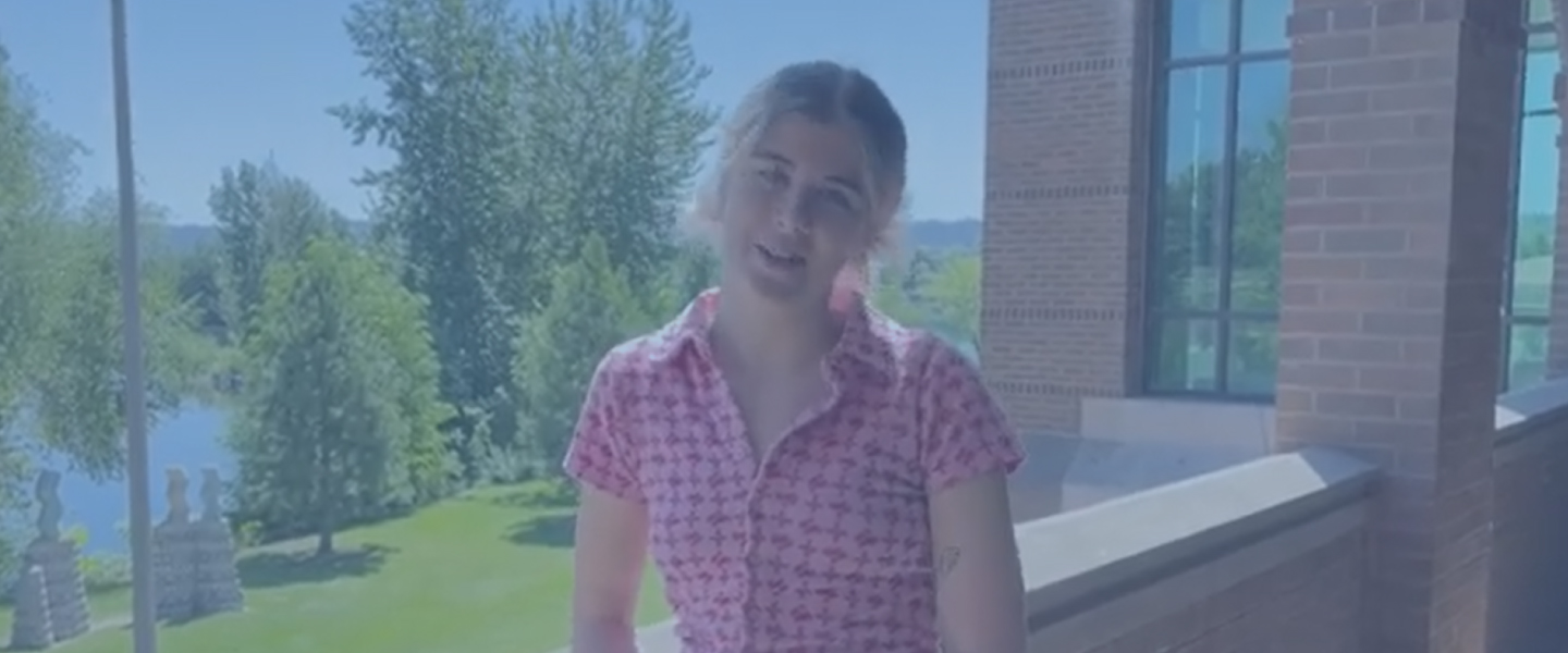 student on a Jundt museum balcony