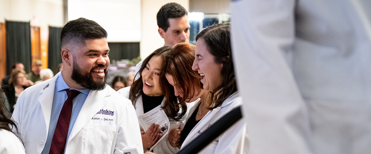Nursing students attend a graduation ceremony