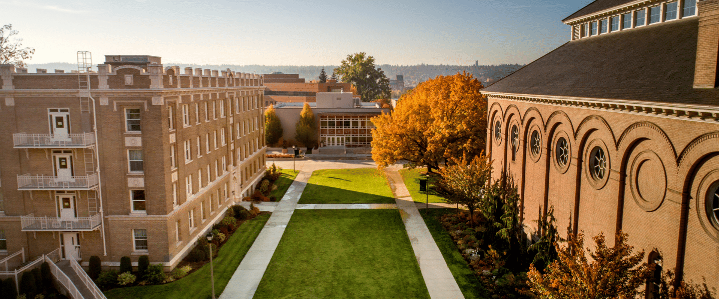 Birds eye view of campus, Desmet Hall on the left, Crosby Center, College hall right