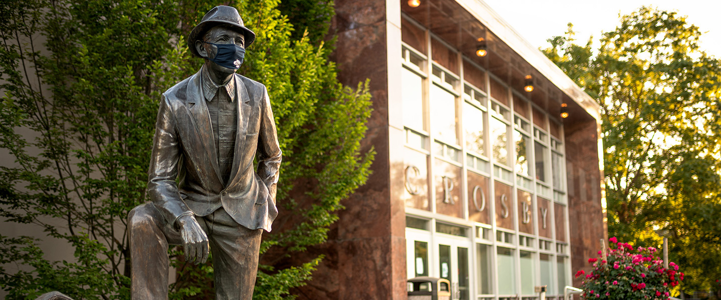 Bing with mask on campus.