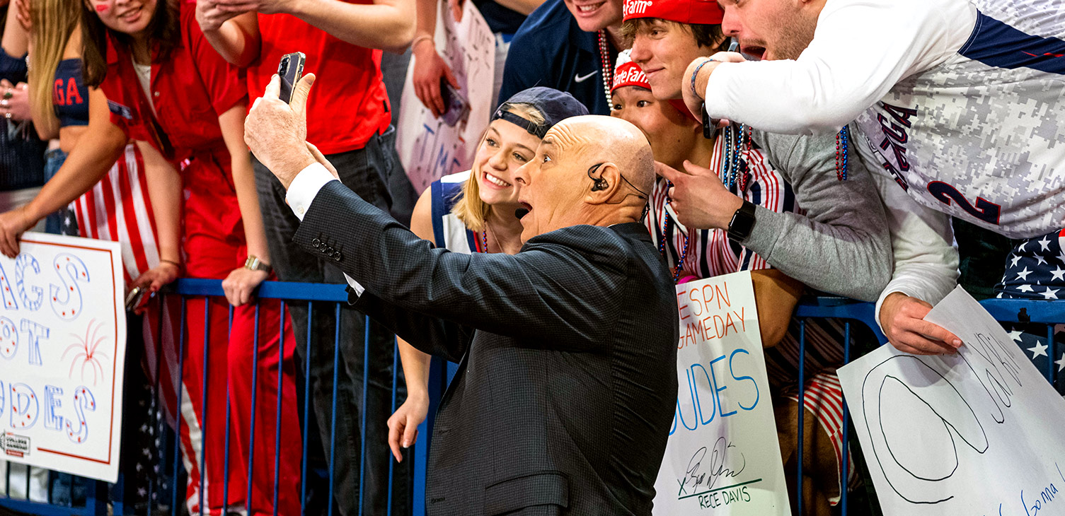 Gonzaga students pose for a selfie with the ESPN College GameDay crew.