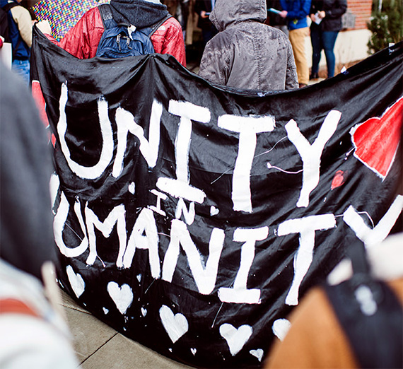 banner that reads unity in humanity