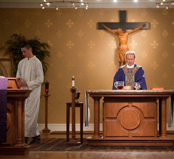 priest during mass at student chapel 