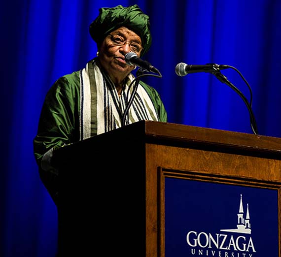 Visiting head of state Ellen Johnson Sirleaf speaks at a podium.
