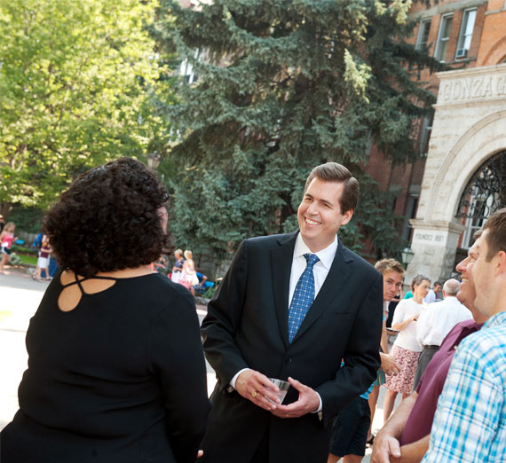 president Mcculloh speaks with visitors 