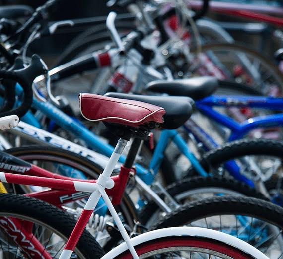 Close-up of lined up bikes.