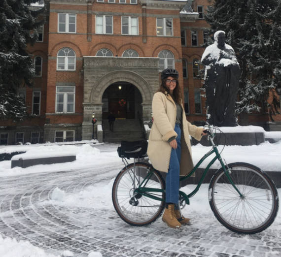 girl on bike on gonzaga campus 