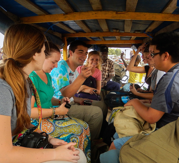Study Abroad students in Benin traveling by bus 