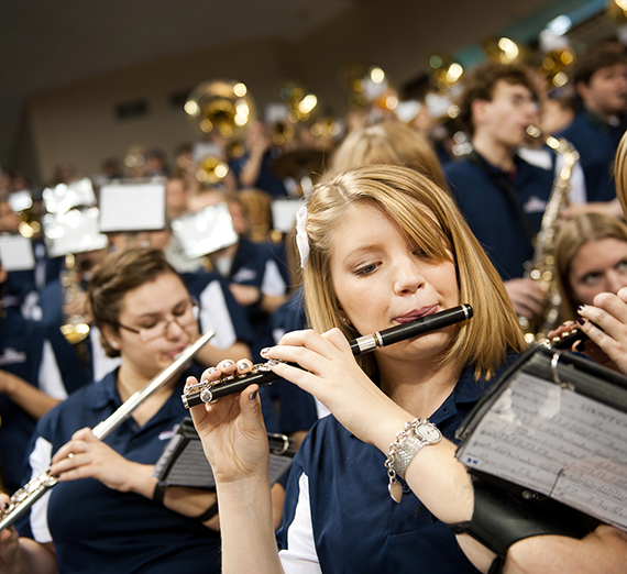 Members of the GU Bulldog Band play at a women's basketball game