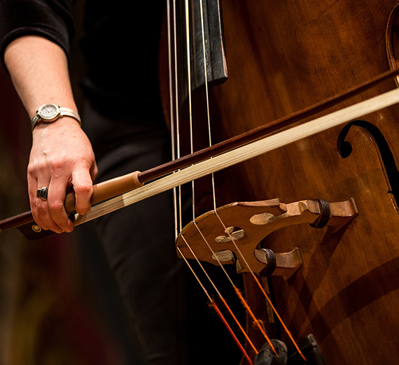 A member of the Gonzaga Symphony Orchestra plays the cello