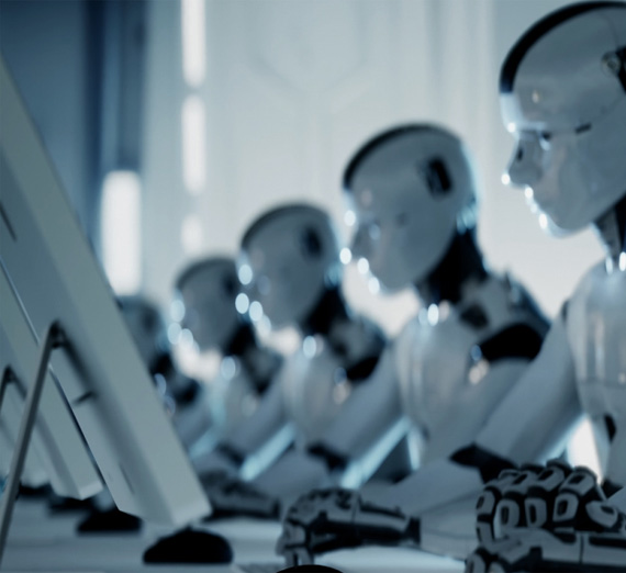 Embracing Generative AI In the Classroom and Office image of white robots sitting lined up at computers in a classroom