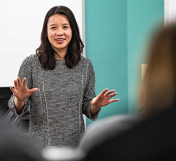 Danielle Xu teaching in classroom
