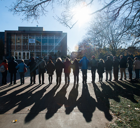 The International Day of Tolerance gathered students, faculty, and staff together and they linked arms to form a human chain of solidarity. 
