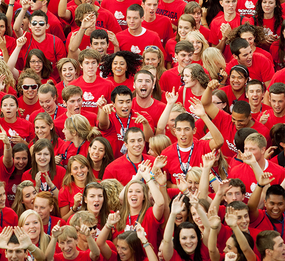 A crowd of new Gonzaga students wear matching t-shirts at Fall Orientation