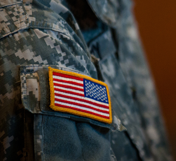 Flag on a military uniform at a veterans event on campus