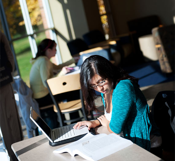 A student studying in jepson lounge 