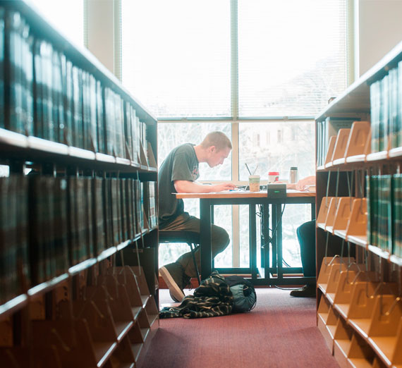 A student studying in Foley Library 