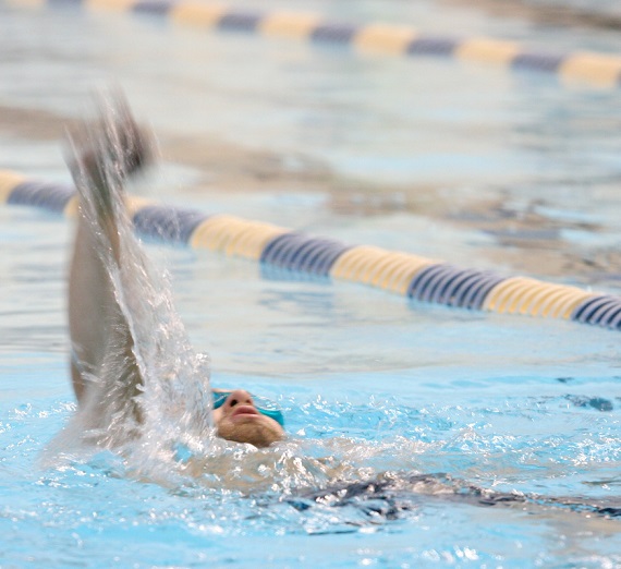 A swimmer competing in the pool