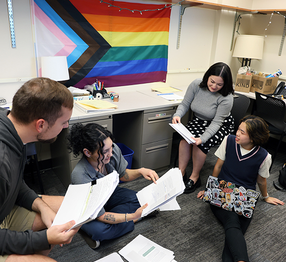 Headshots of four new faculty members