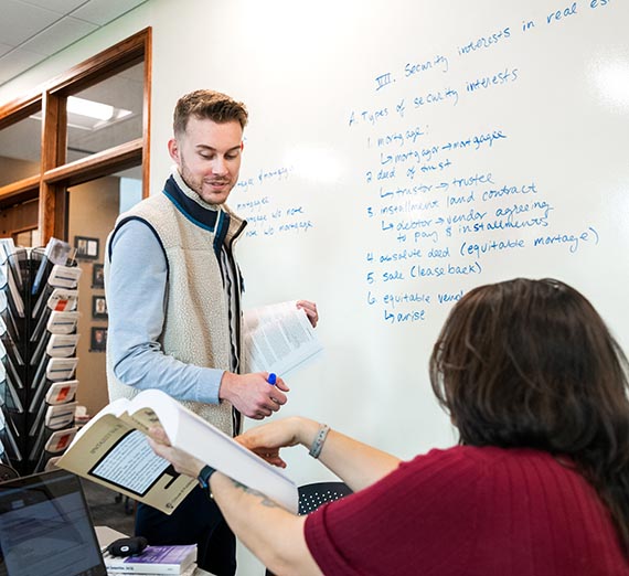 Glass door with Gonzaga Law seal printed on it