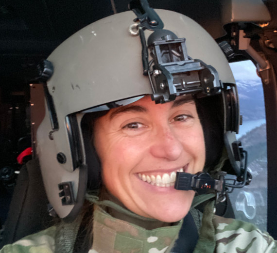 Law School Graduate Melissa Coombes rides in helicopter
