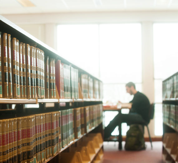 student studying in law library 