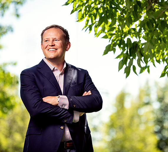 Dean Rooksby outside on a sunny day