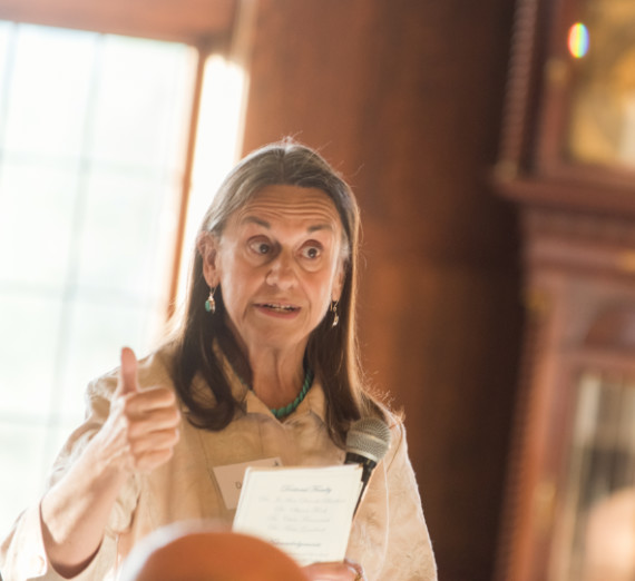 Doctoral Program Students and Professor at table