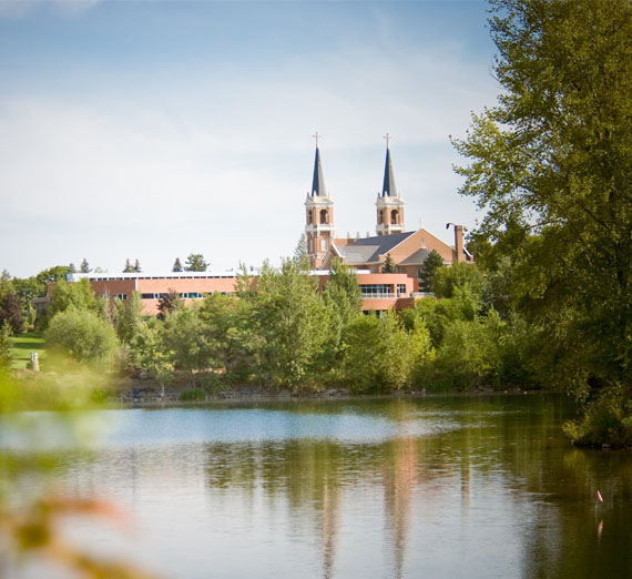 view of campus from across the river 