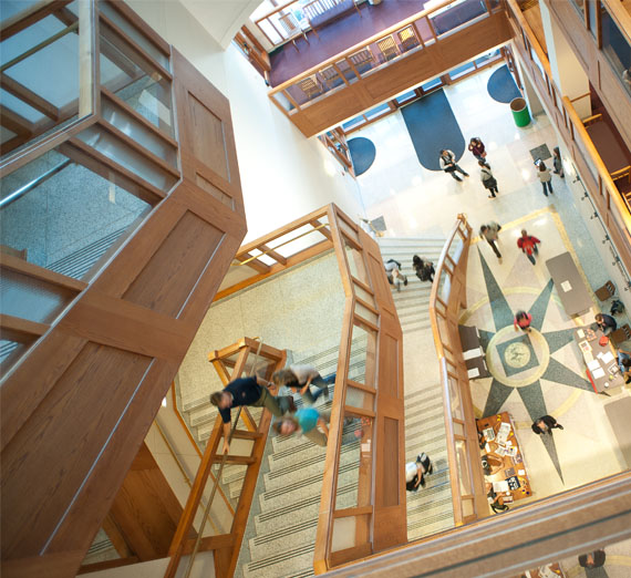 Staircase with students inside law school library  