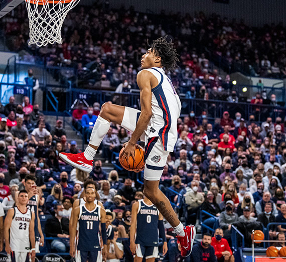 Guard Hunter Sallis performs a through-the-legs dunk at Gonzaga's Kraziness in the Kennel event.