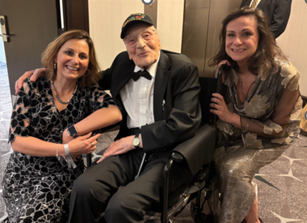 President Katia Passerini and 104 year old veteran.