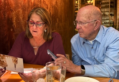 John (son of Mary Stuart) and Janet Rogers (granddaughter of Mary Stuart) reading a note.