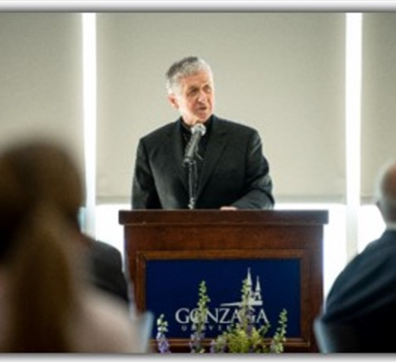 Cupich giving a speech