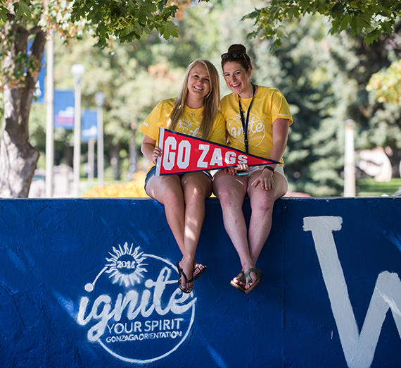 Gonzaga students hold GO ZAGS sign
