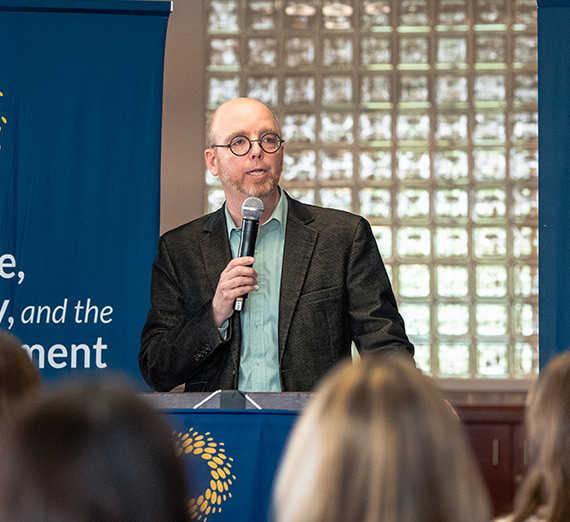 Professor Brian Henning addresses the crowd.