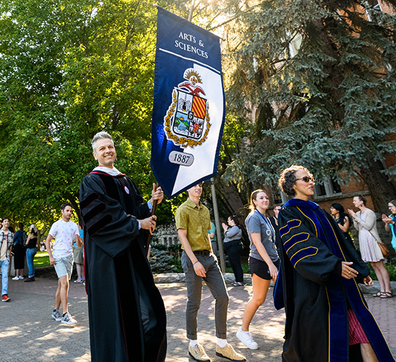 Faculty walk with students to Academic Convocation.