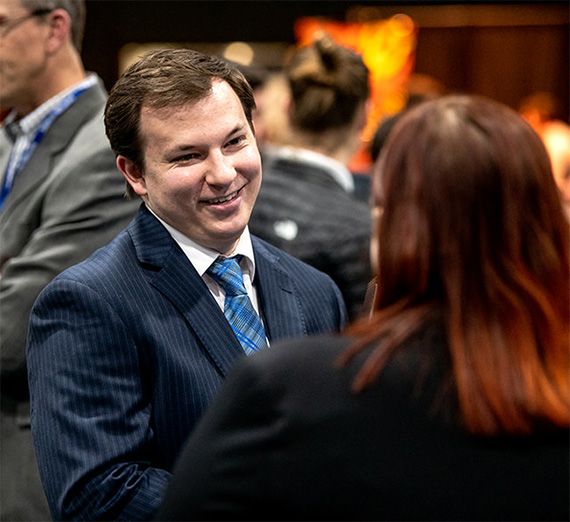 man in suit at career fair
