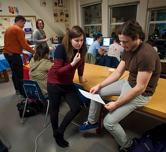 Bulletin page editors review copy changes before the newspaper goes to press.