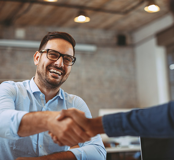 Two people shaking hands