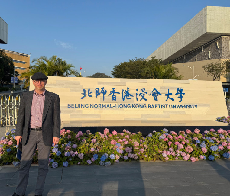 Dr. Brian Henning of the Gonzaga University Department of Philosophy in front of the Beijing Normal-Hong Kong Baptist University where he presented at a conference.